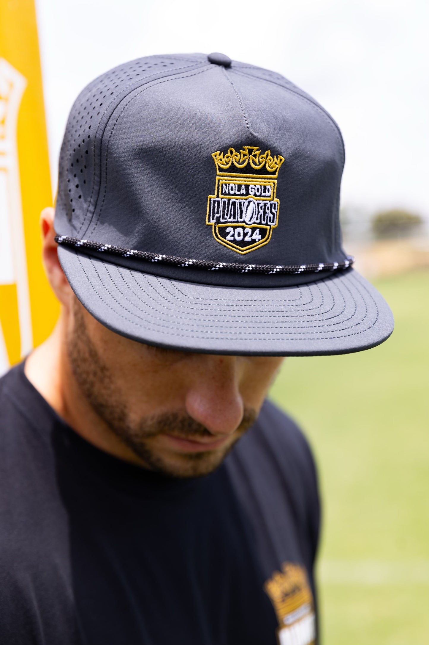 NOLA Gold Dk Grey Golf Hat w/ Rope (2024 Playoff Logo)